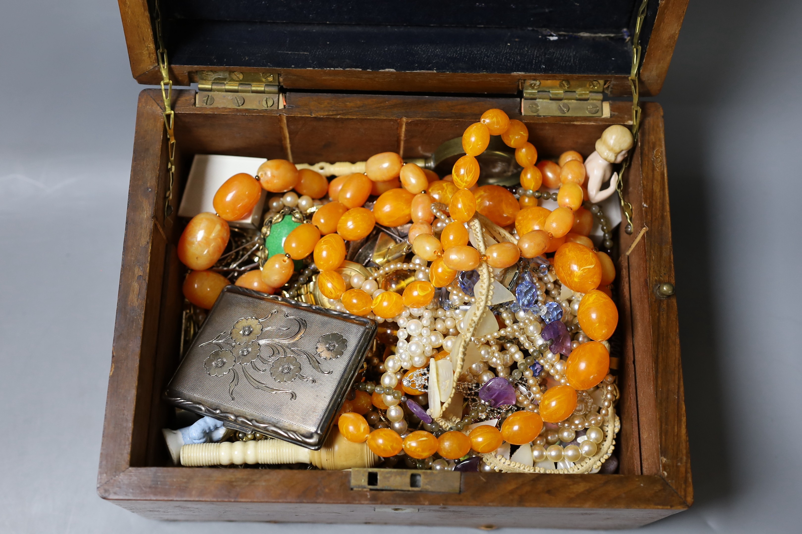 A large quantity of mixed costume jewellery in two boxes.